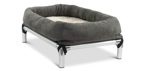 oatmeal and cream color of the Pillow Pad and Bolster combo accessory, the pillow pad is nested inside of the bolster, which are both on top of a Kuranda Bed and held down by straps at the corners.