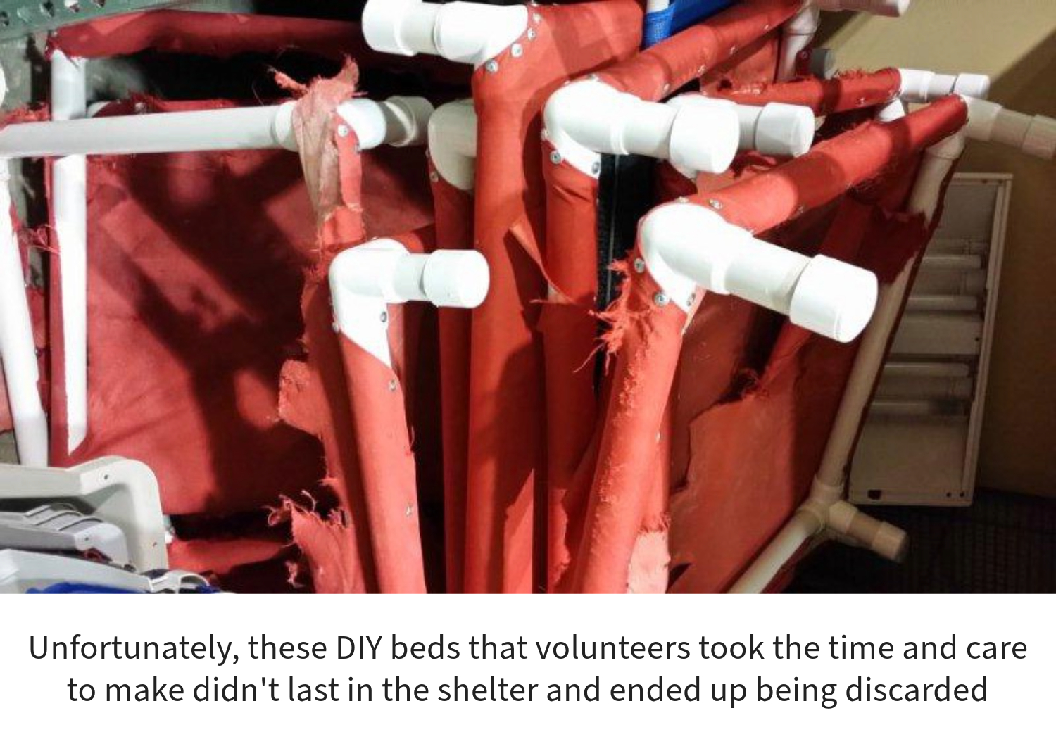 Destroyed pile of DIY raised dog beds, text on image reads “Unfortunately, these DIY beds that volunteers took the time and care to make didn’t last in the shelter and ended up being discarded.”
