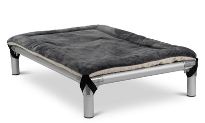 Smoke and Cream Pillow Pad shown on top of a Kuranda Bed. The Smoke grey color is shown on top of the pad, the bottom side cream is facing down towards the bed.